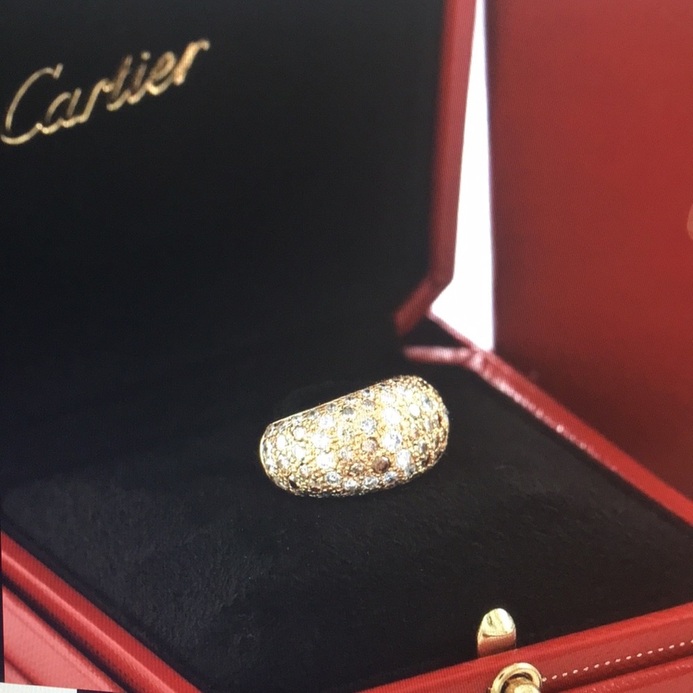 Cartier diamond 18kt gold sauvage dome ring.